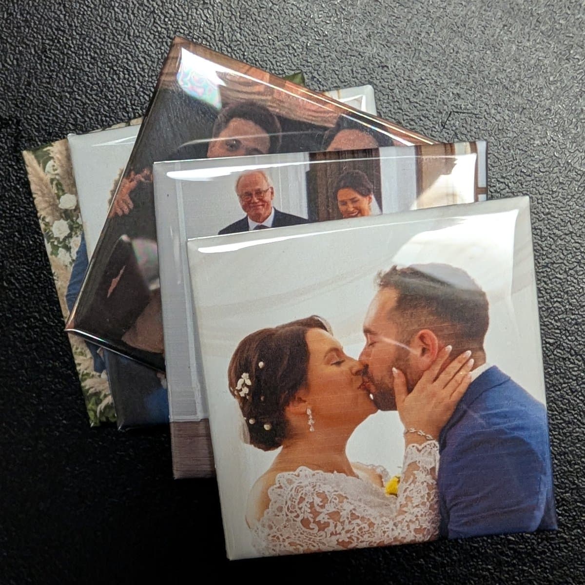 Stack of custom photo magnets from Tender Kept